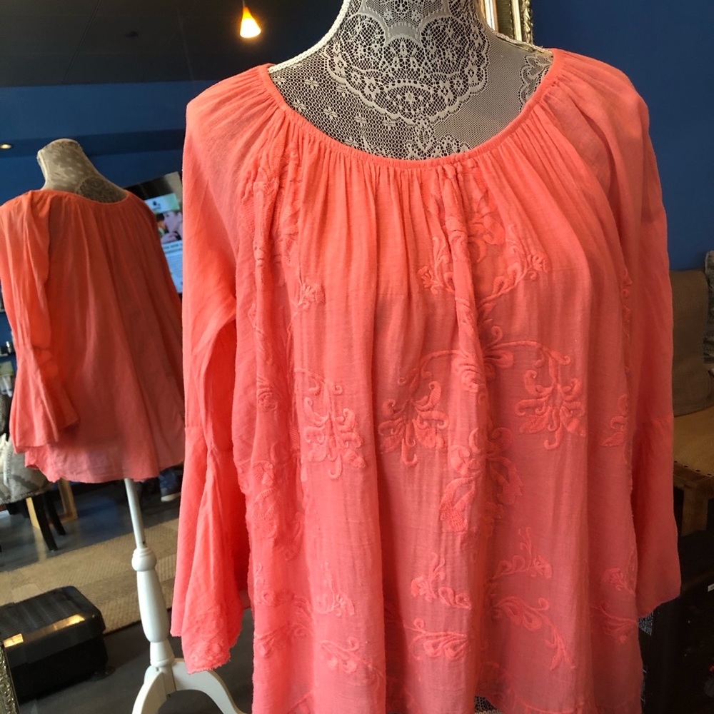 Tangerine Tempo of Paris top.